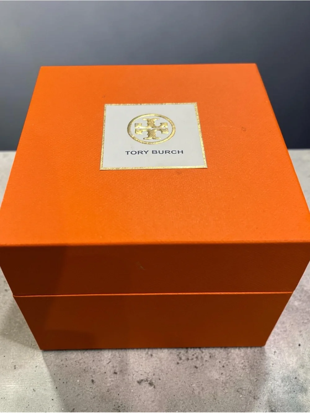 Tory Burch Gold-Tone Watch with Interchangeable Bezels in Cream, Pink, Red, Navy